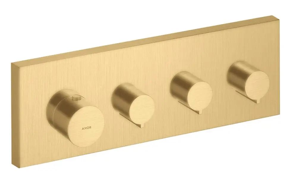 Thermostatmodul mit drei Drehreglern in gebürstetem Gold-Finish, montiert auf einer rechteckigen Platte. Hersteller: AXOR.